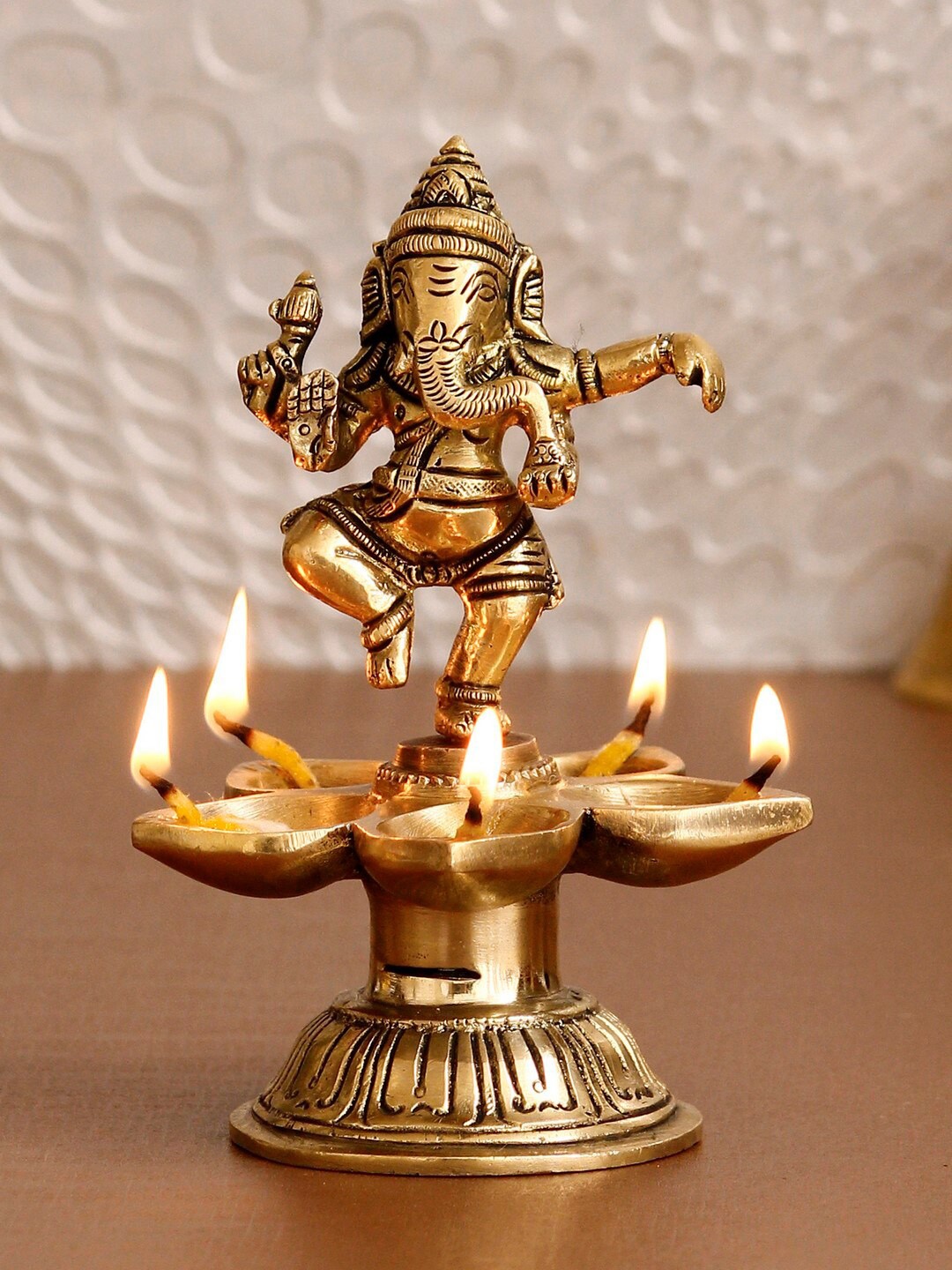 

eCraftIndia Gold-Toned Handcrafted Dancing Lord Ganesha Showpiece With Diya