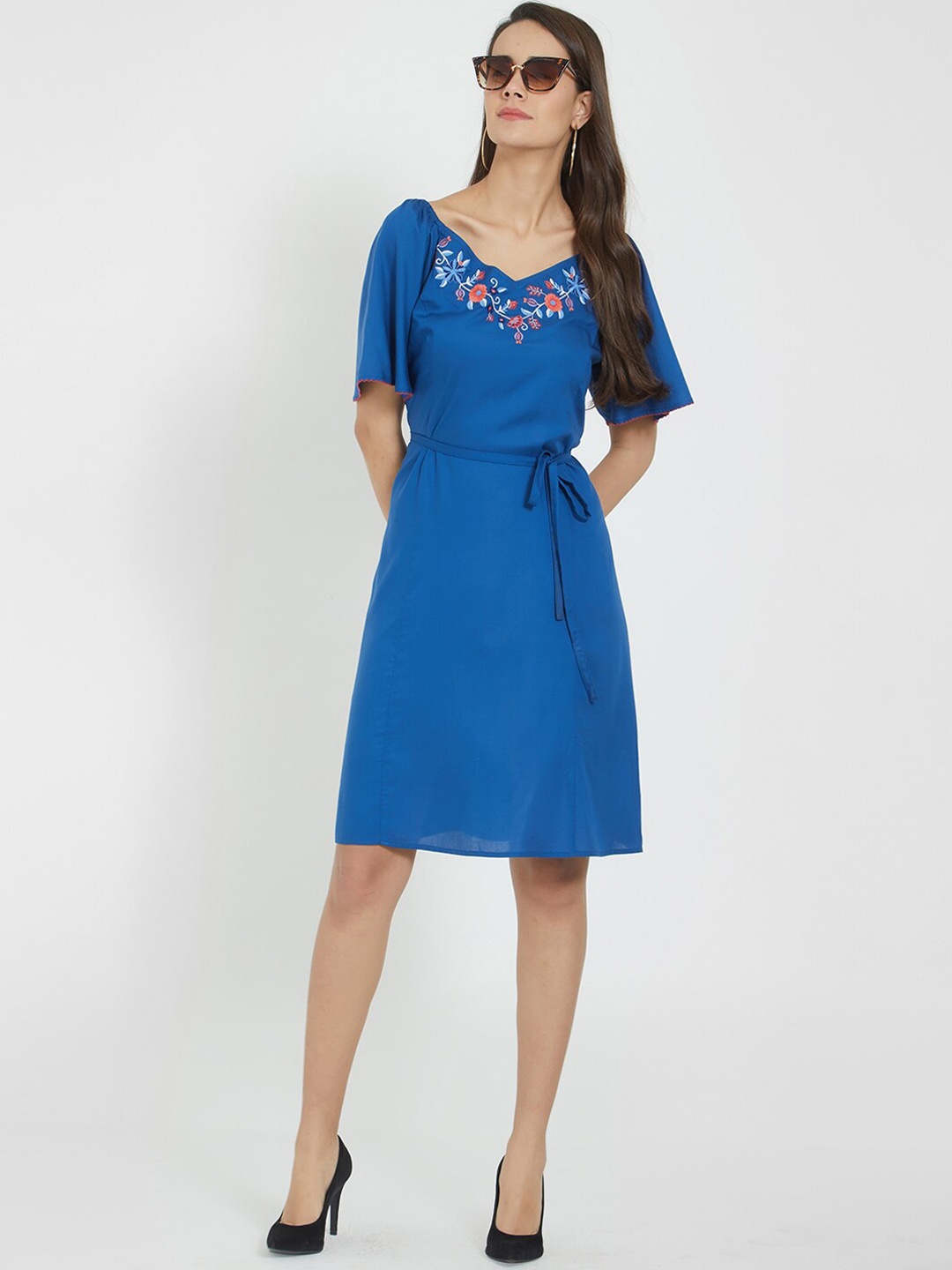 

Fusion Beats Women Blue Solid A-Line Dress With Embroidered Details With Belt