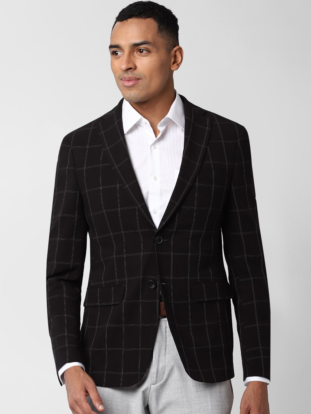 

Peter England Elite Men Black Checked Single Breasted Blazer