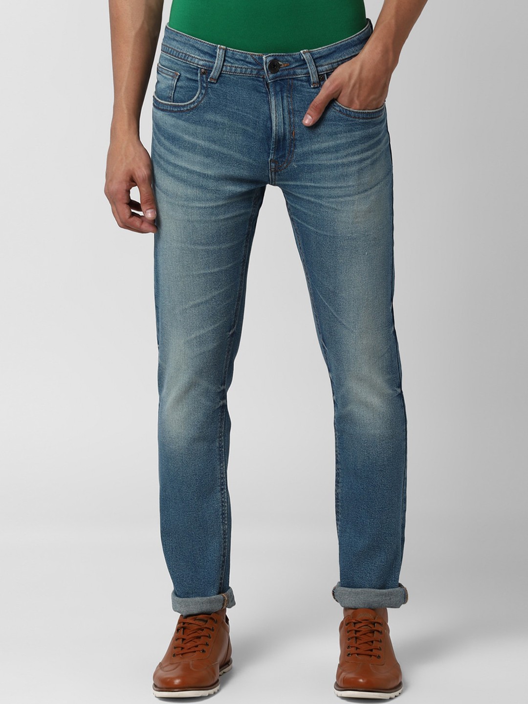 

Peter England Casuals Men Blue Tapered Fit Mid-Rise Clean Look Jeans