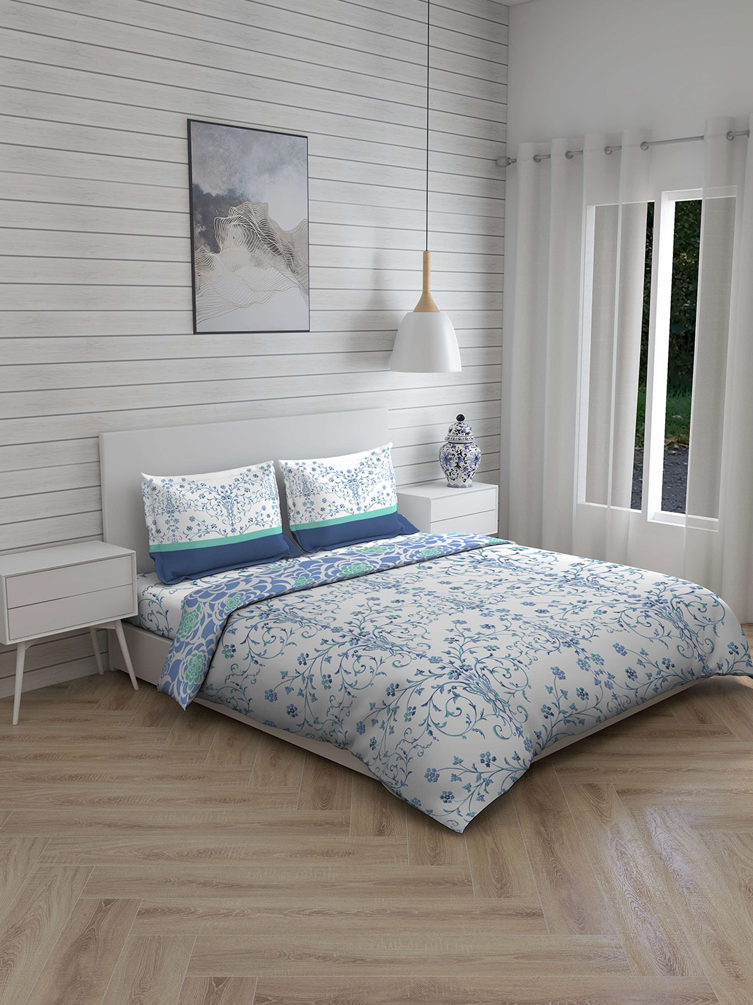 

Layers Blue & White Floral Printed 148 TC Double Queen Bedding Set With Comforter