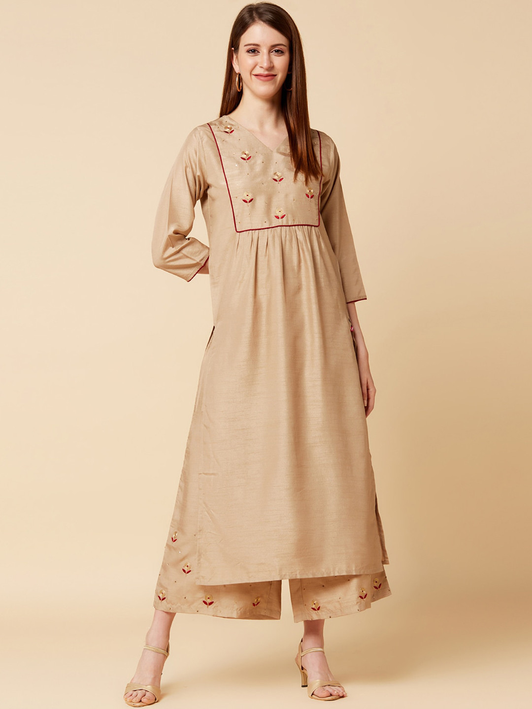 

Varanga Women Beige Kurta and Palazzo Set