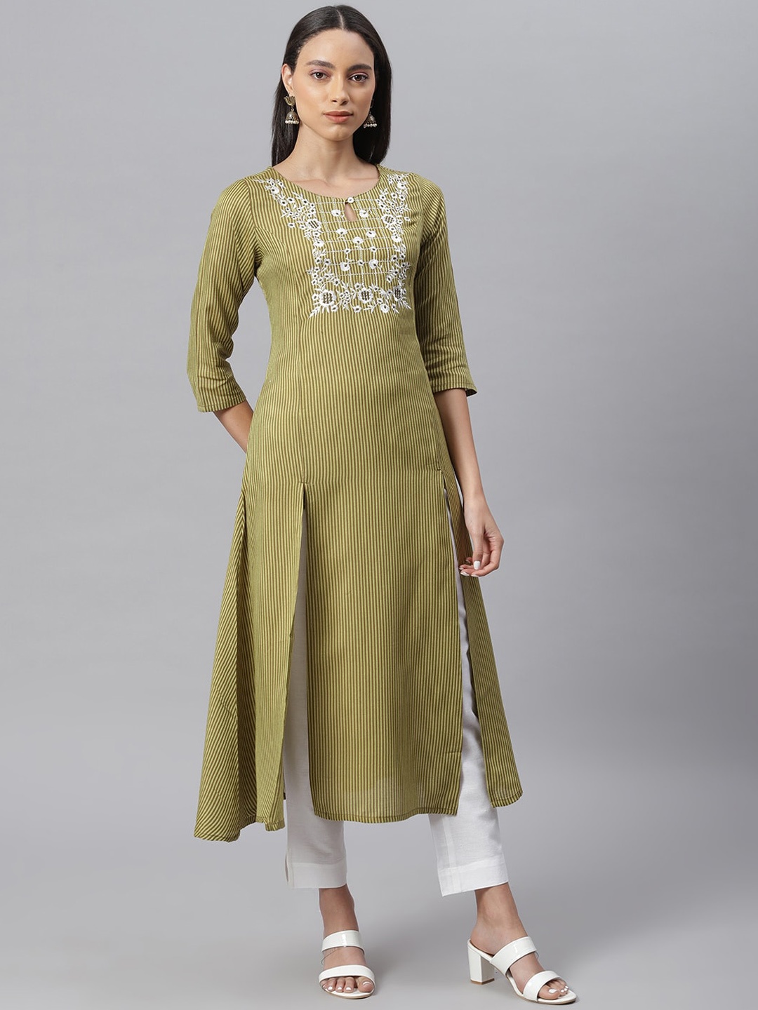 

Janasya Women Olive Green & Off-White Embroidered Kurta with Trousers