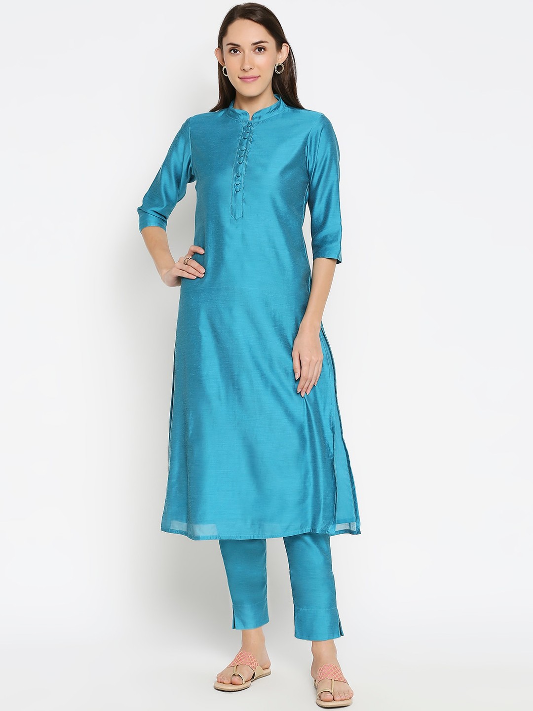 

Desi Weavess Women Blue Solid Kurti with Trousers