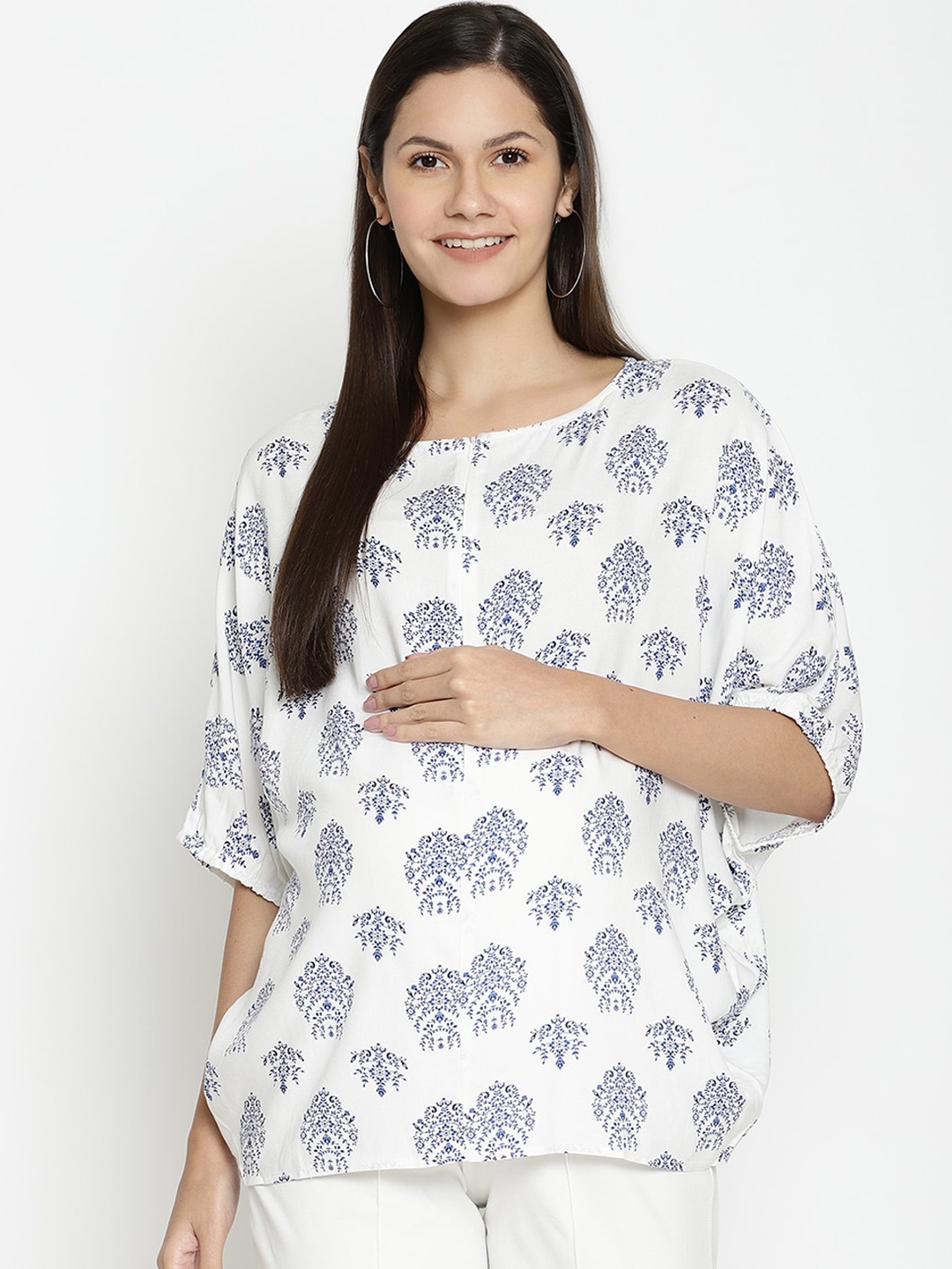 

The Vanca White & Blue Printed Regular Top