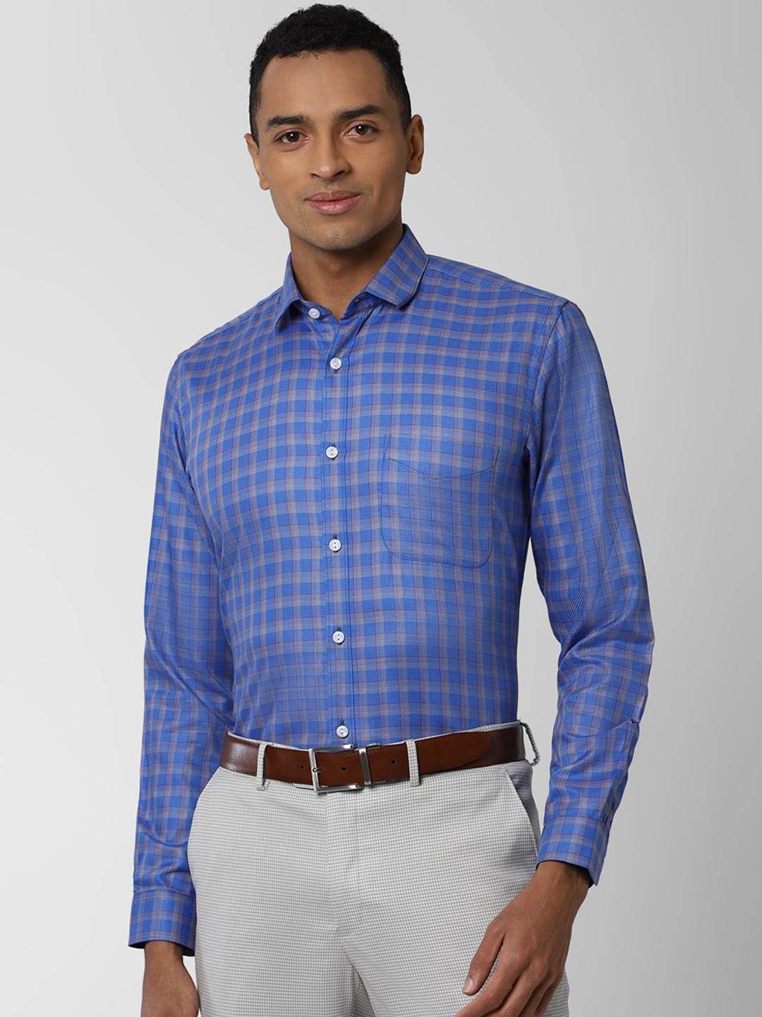 

Peter England Elite Men Blue Regular Fit Checked Casual Shirt