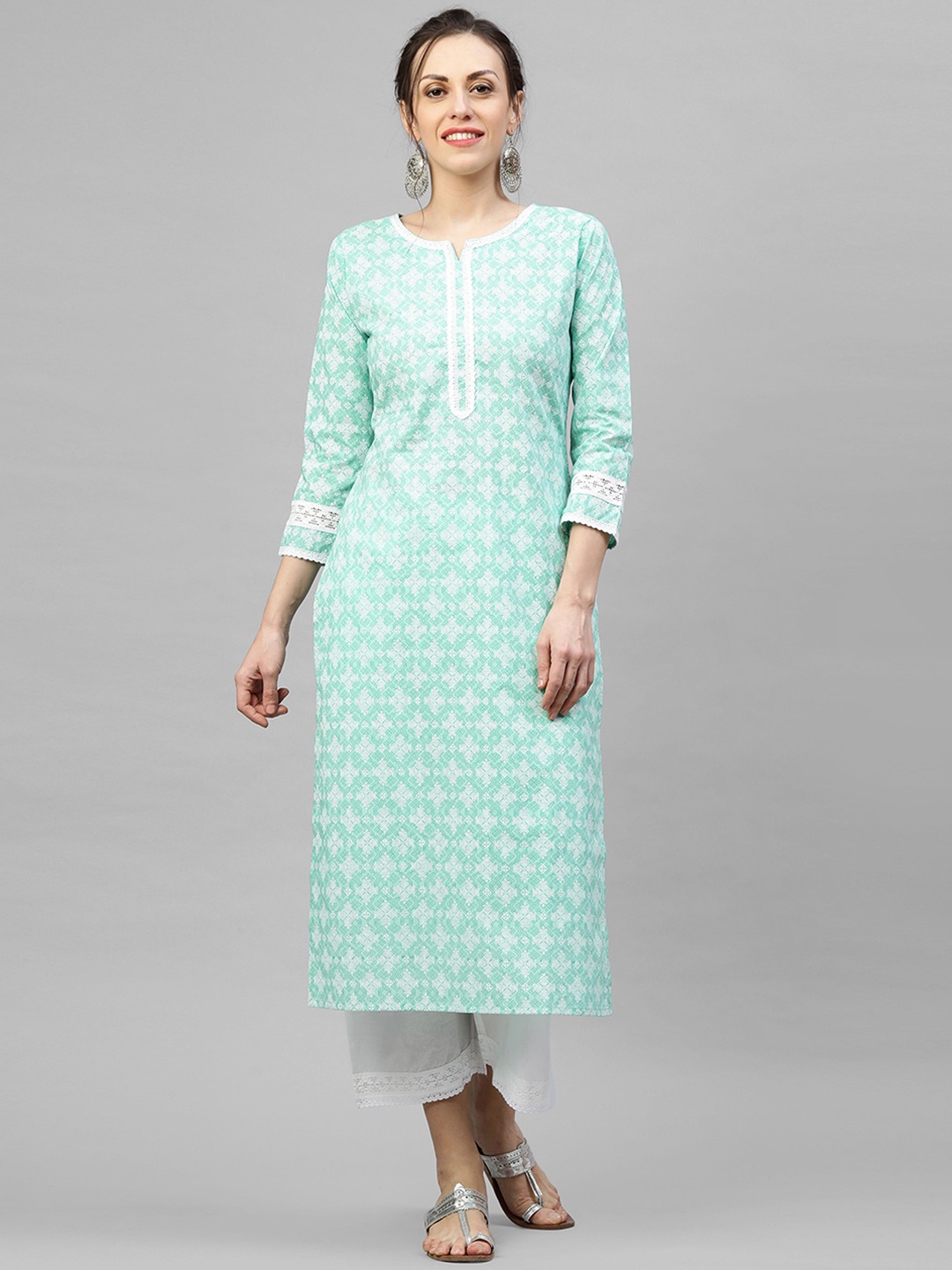 

Indo Era Women Sea Green & White Printed Kurta with Trousers