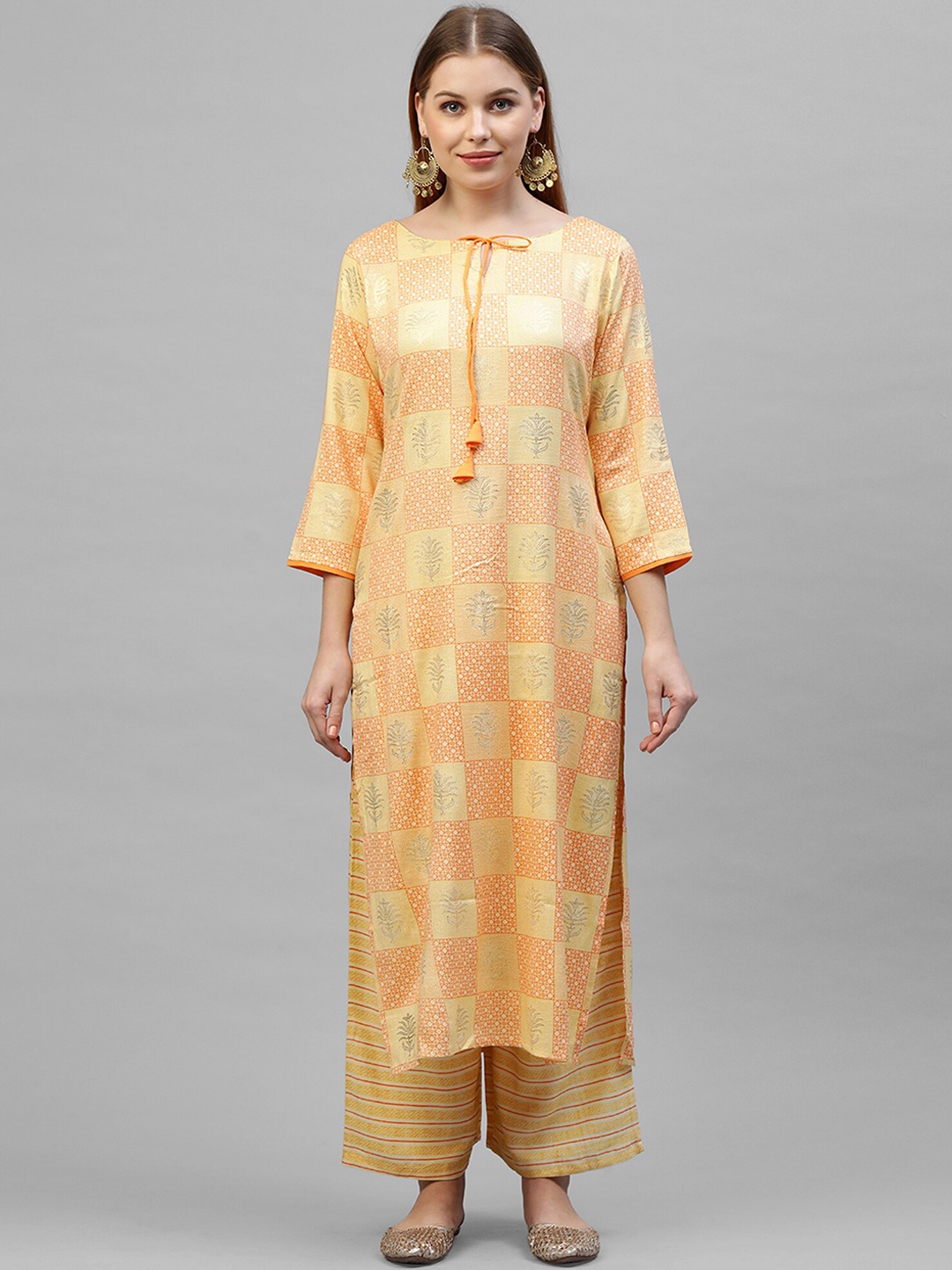 

Indo Era Women Yellow Printed Kurta with Palazzos