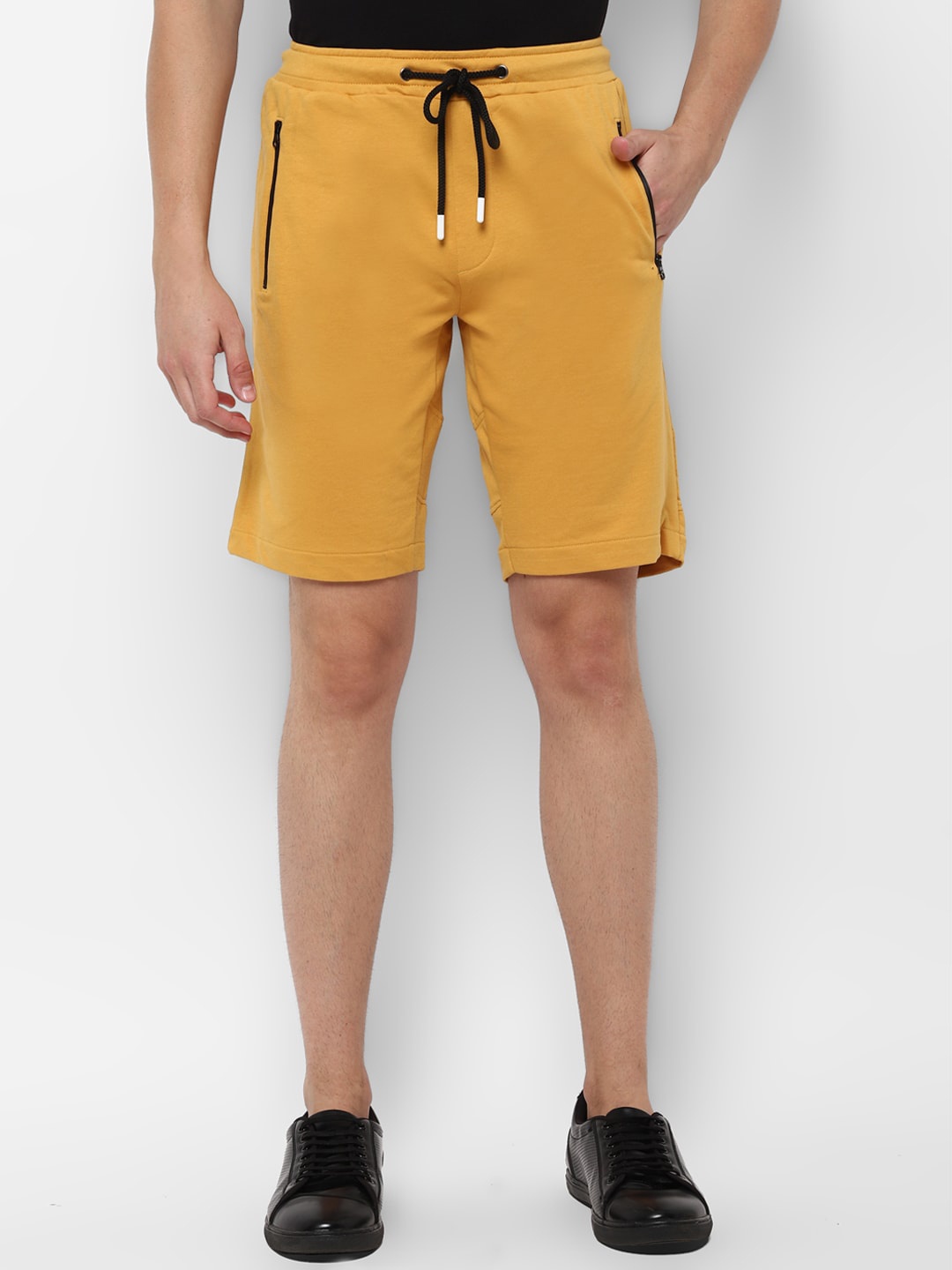 

Allen Solly Tribe Men Mustard Yellow Solid Slim Fit Regular Shorts
