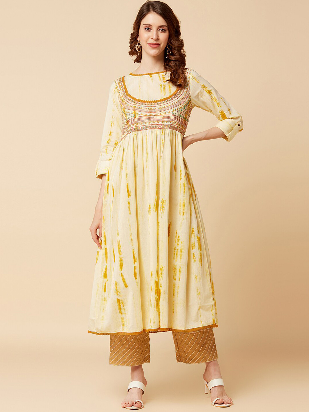 

Varanga Women Cream-Coloured Ethnic Motifs Dyed Thread Work Pastels Anarkali Kurta