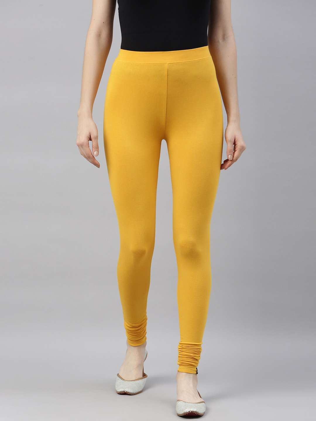

TWIN BIRDS Women Mustard Yellow Solid Churidar-Length Leggings