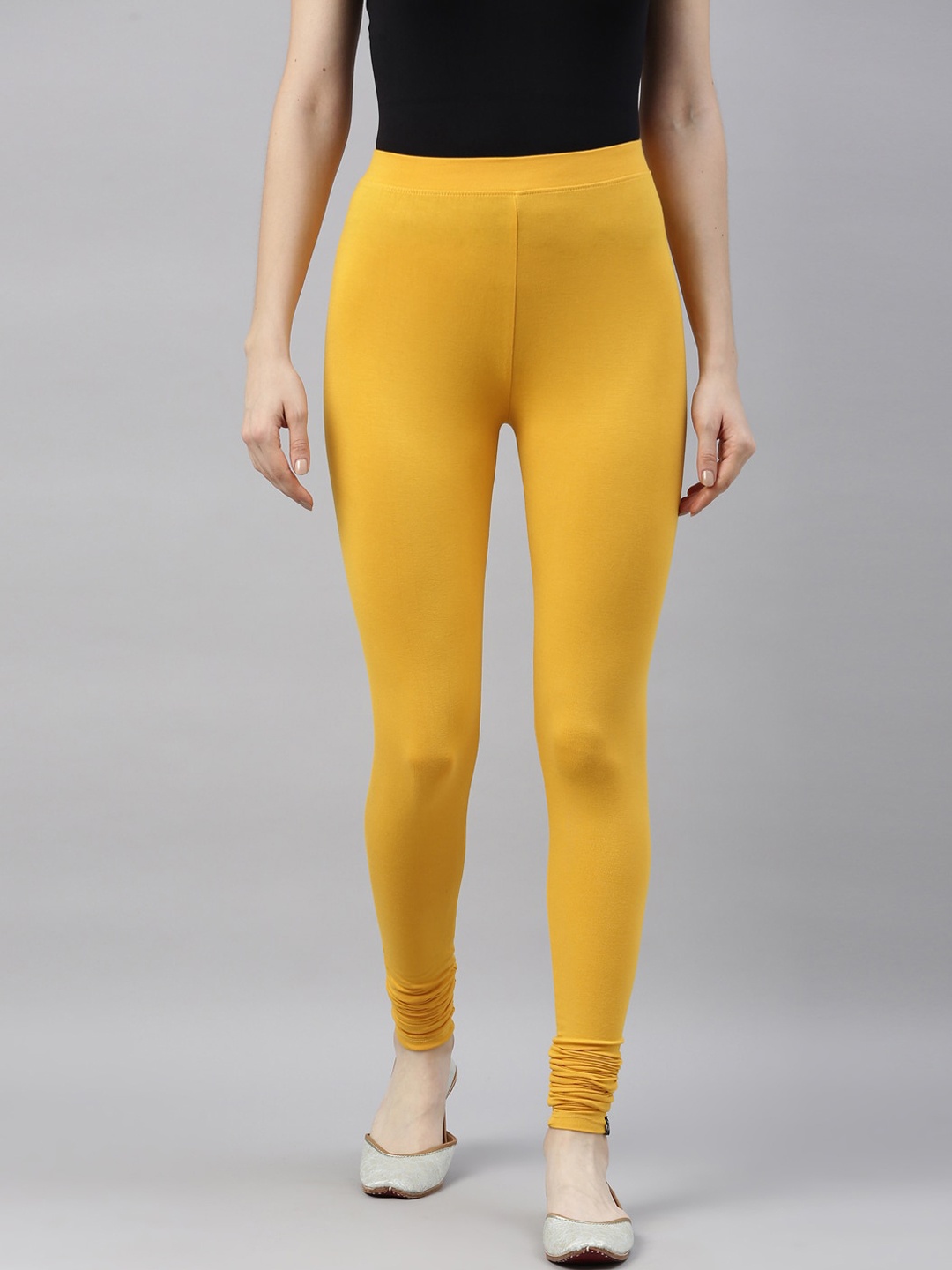 

TWIN BIRDS Women Mustard Yellow Solid Churidar-Length Leggings