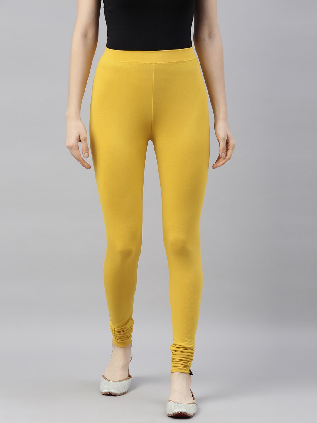 

TWIN BIRDS Women Mustard Yellow Solid Churidar-Length Leggings