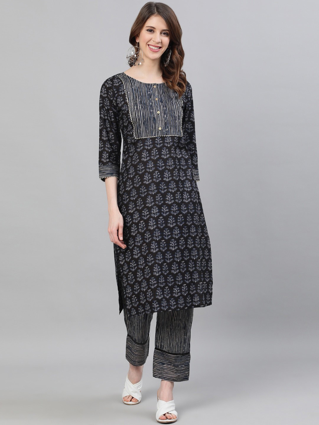 

Ishin Women Black Printed Kurta with Trousers