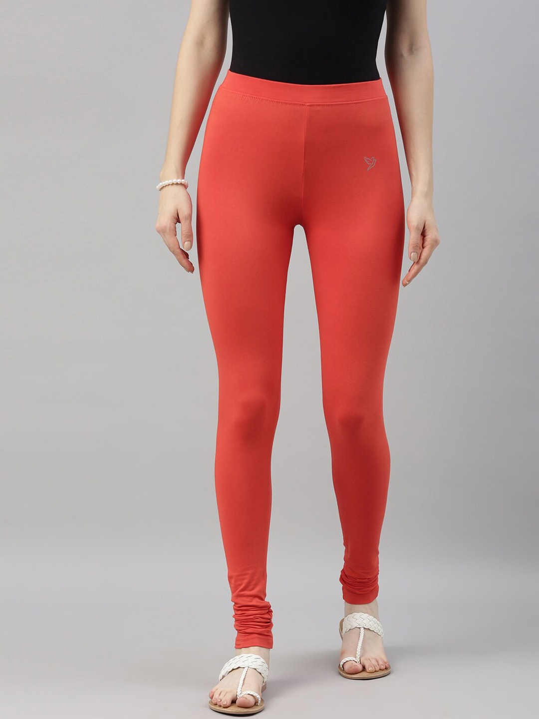 

TWIN BIRDS Women Coral Orange Solid Churidar-Length Leggings