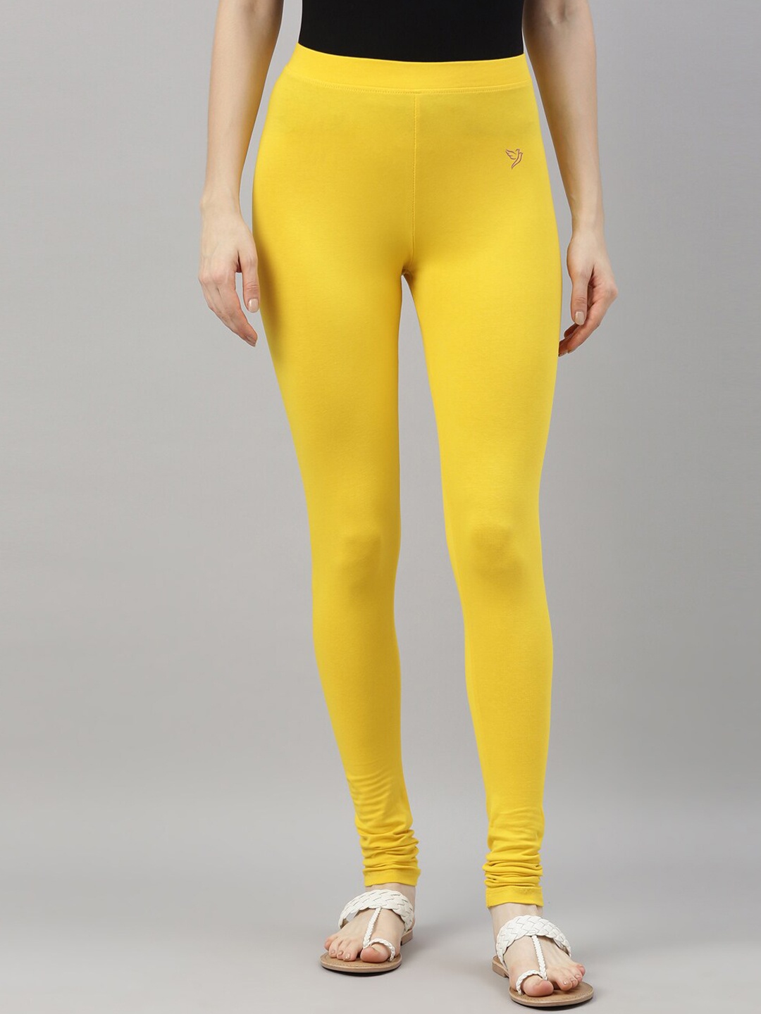 

TWIN BIRDS Women Yellow Solid Churidar-Length Leggings