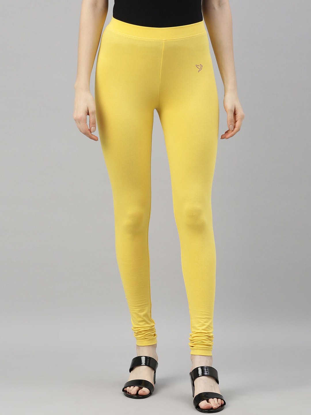 

TWIN BIRDS Women Yellow Solid Churidar-Length Leggings