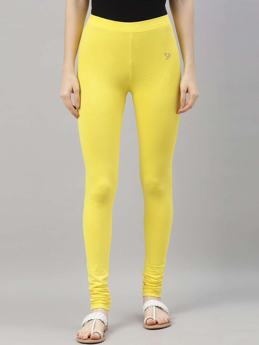 

TWIN BIRDS Women Yellow Solid Churidar-Length Leggings
