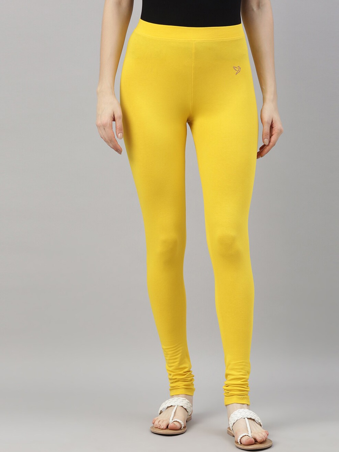 

TWIN BIRDS Women Yellow Solid Churidar-Length Leggings