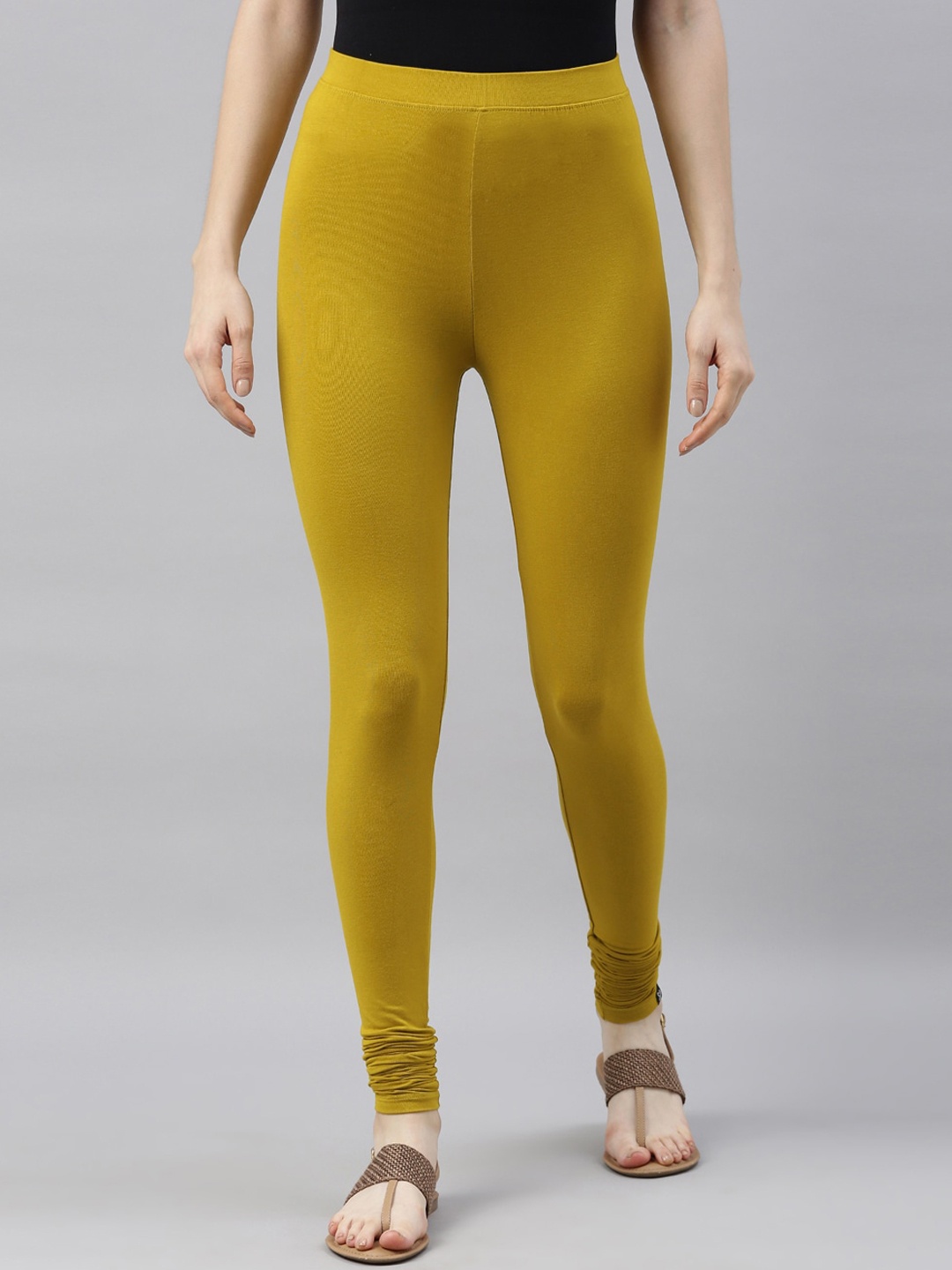

TWIN BIRDS Women Mustard Yellow Solid Churidar Length Leggings