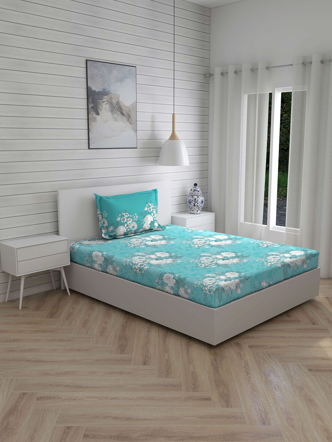 

Layers Blue & White Floral 104 TC Cotton 1 Single Bedsheet with 1 Pillow Covers