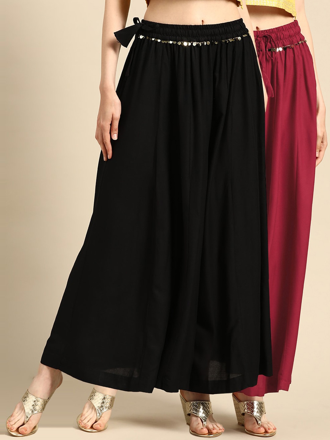 

TAG 7 Women Black & Maroon Solid Flared Palazzos