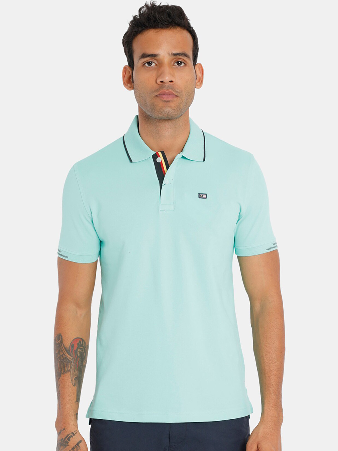 

Arrow Sport Men Green Solid Polo Collar T-shirt