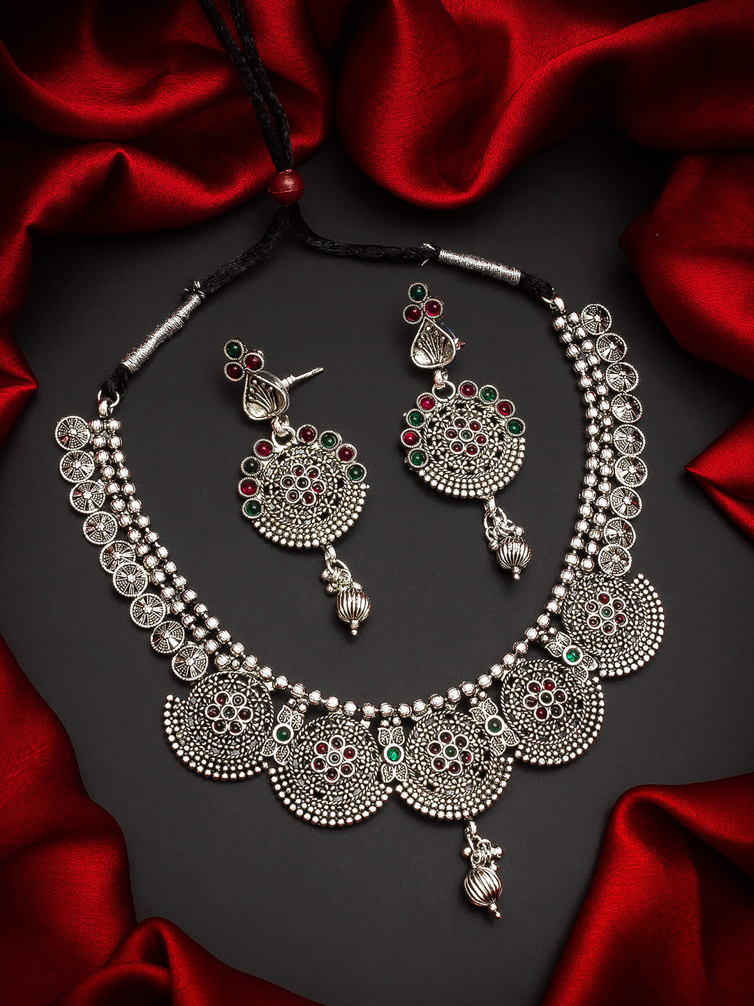 

aadita Oxidised Silver-Plated Red & Green Stone-Studded & Beaded Tribal Jewellery Set