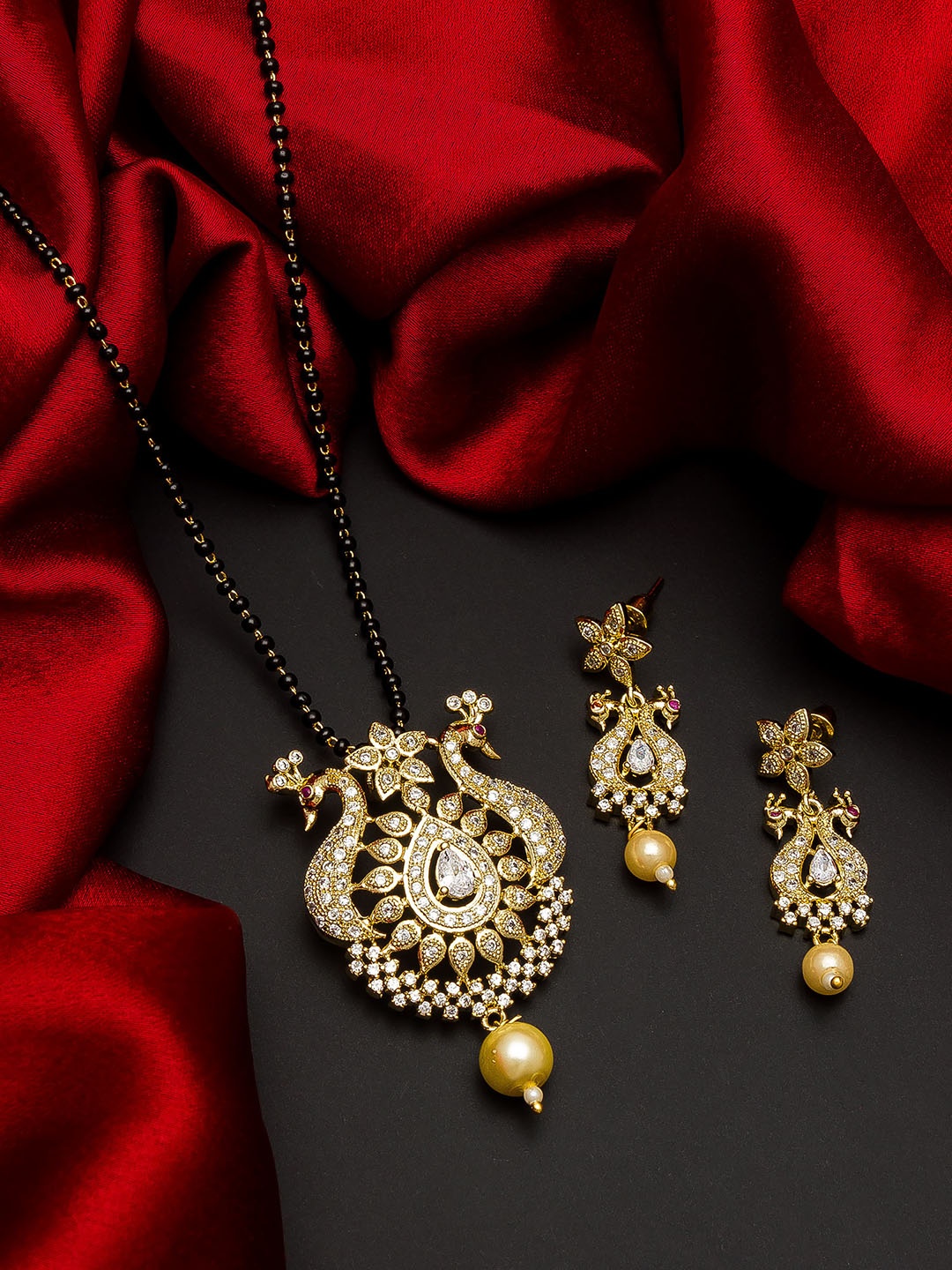 

aadita Gold-Plated Black & White AD-Studded & Pearl Beaded Mangalsutra With Earrings