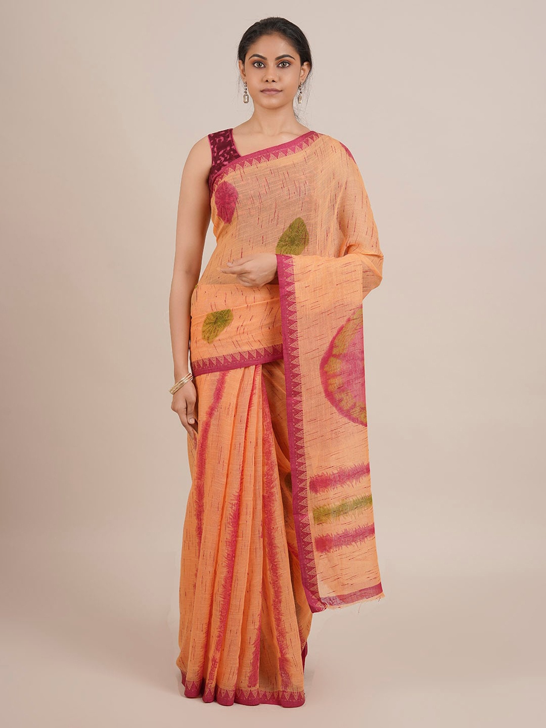

Pothys Orange Printed Linen Blend Saree