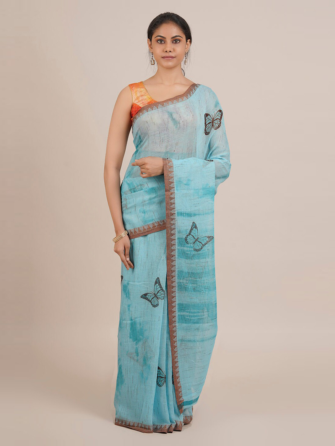 

Pothys Blue Printed Linen Blend Saree
