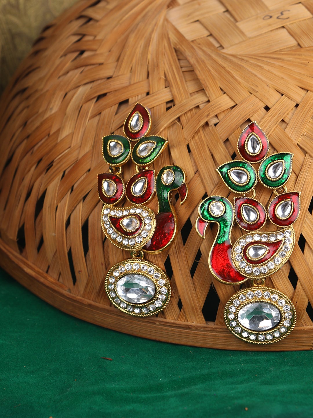 

ANIKAS CREATION Gold-Plated & Red Meenakari Peacock Shaped Jhumkas