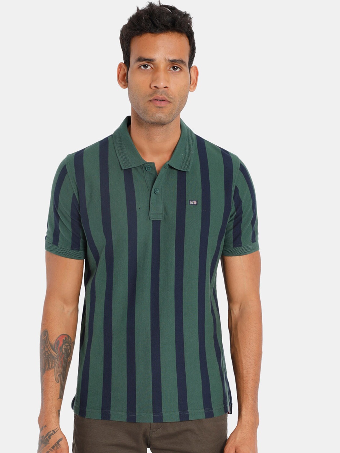 

Arrow Sport Men Green Striped Polo Collar T-shirt