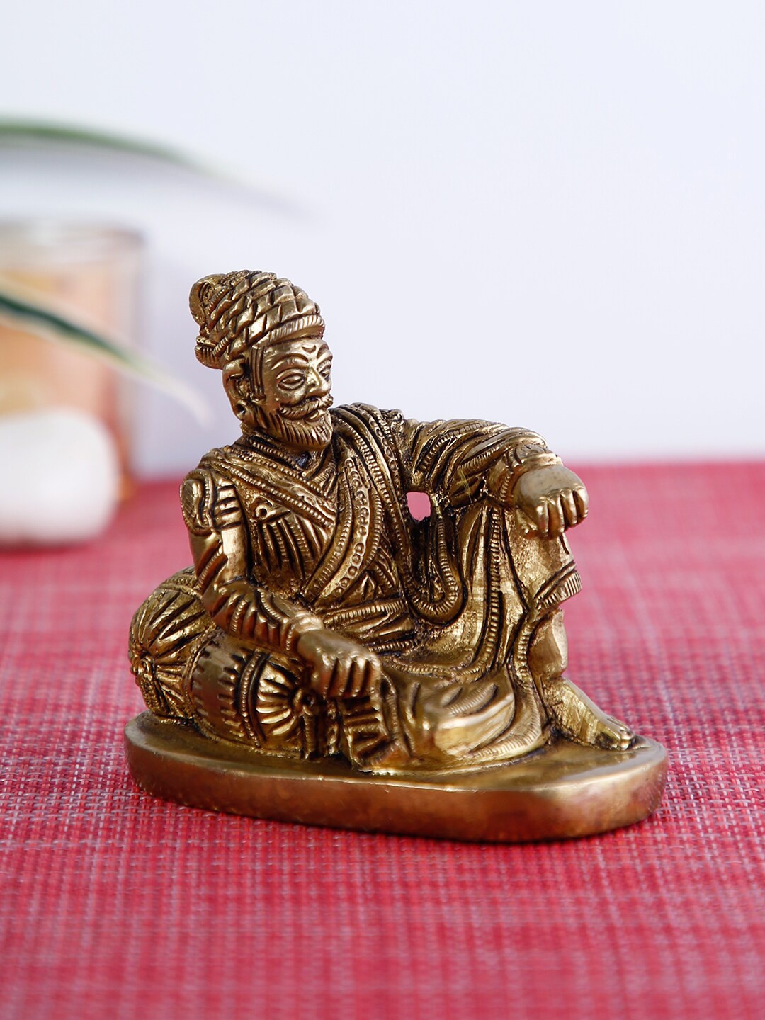 

CraftVatika Gold-Toned Shivaji Maharaj Statue Showpiece