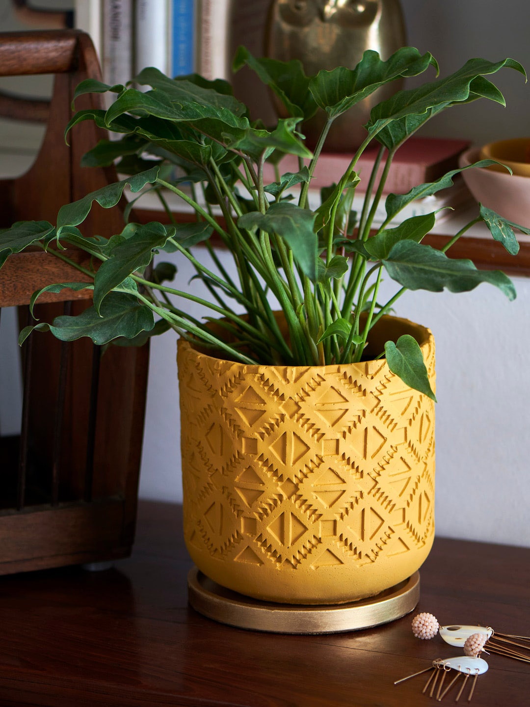 

Chumbak Brown Carved Cement Planter