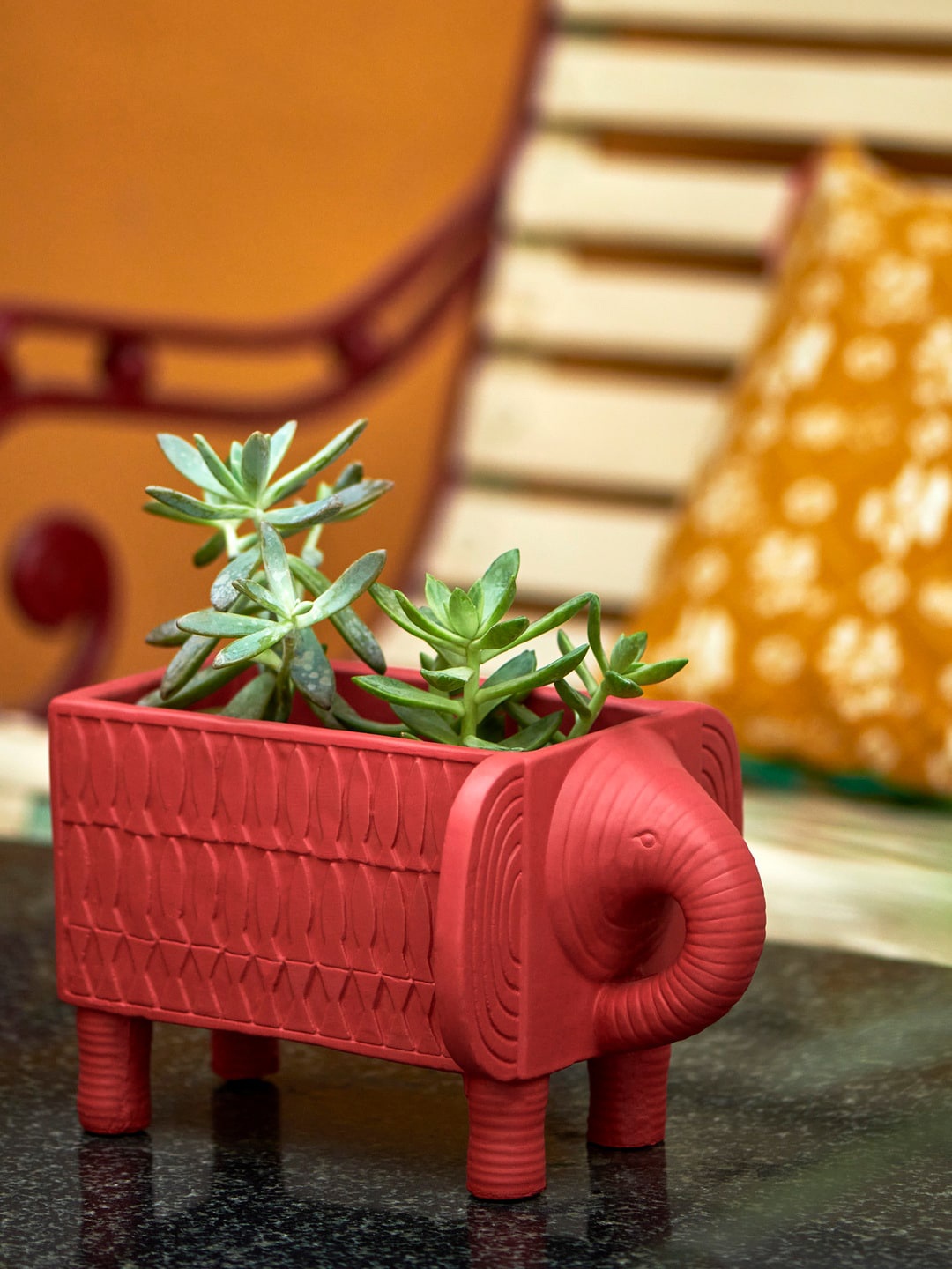 

Chumbak Unisex Red Elephant Carved Rectangle Planter with Legs