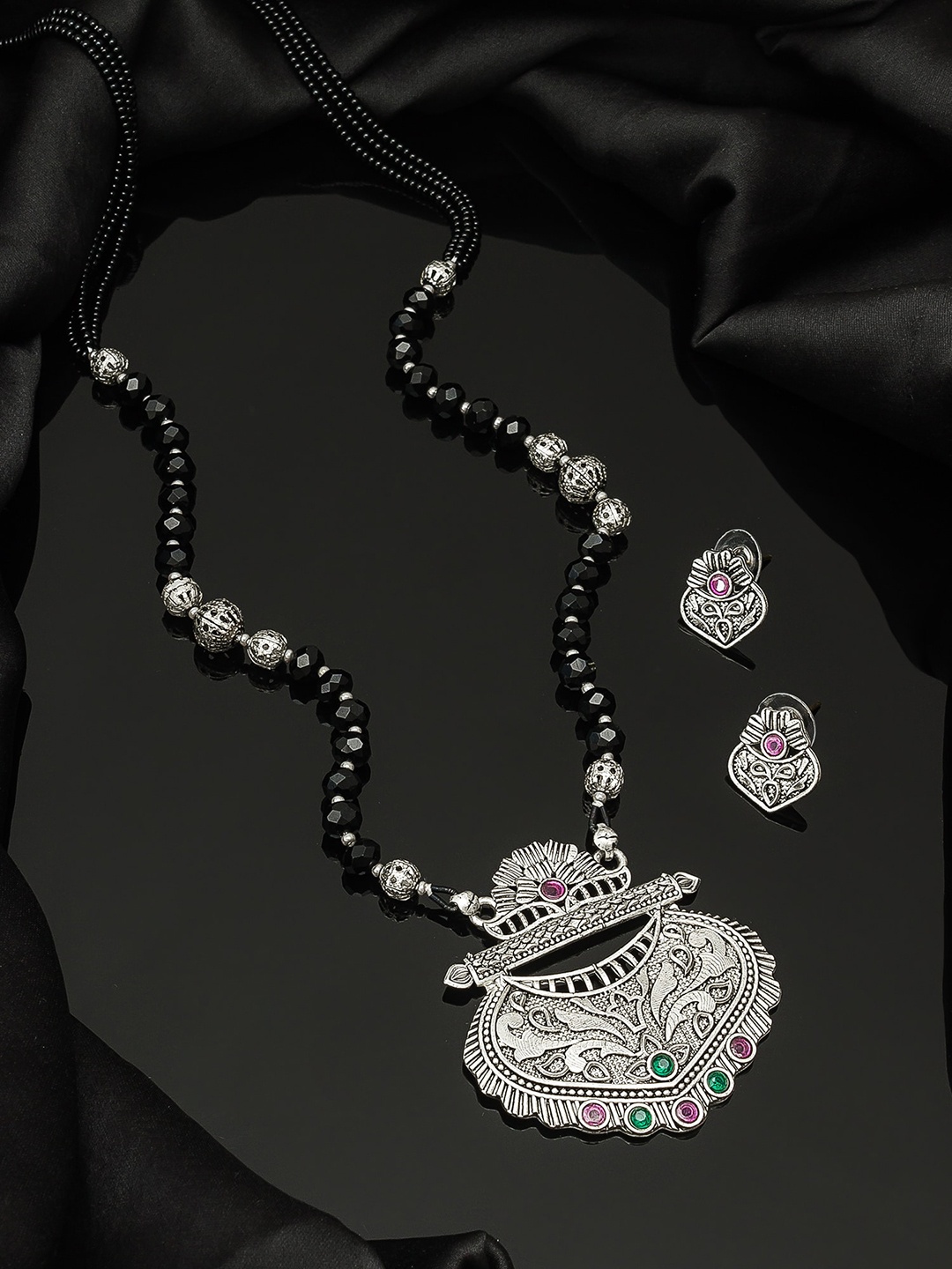 

aadita Oxidized Silver-Toned & Black Stone-Studded Tribal Mangalsutra With Earrings