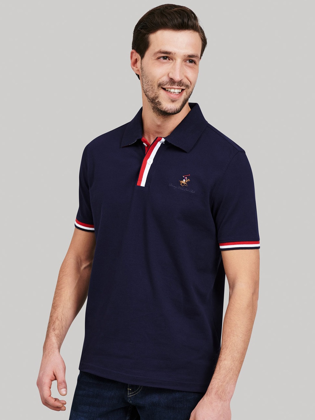 

Beverly Hills Polo Club Men Navy Blue Solid Polo Collar T-shirt