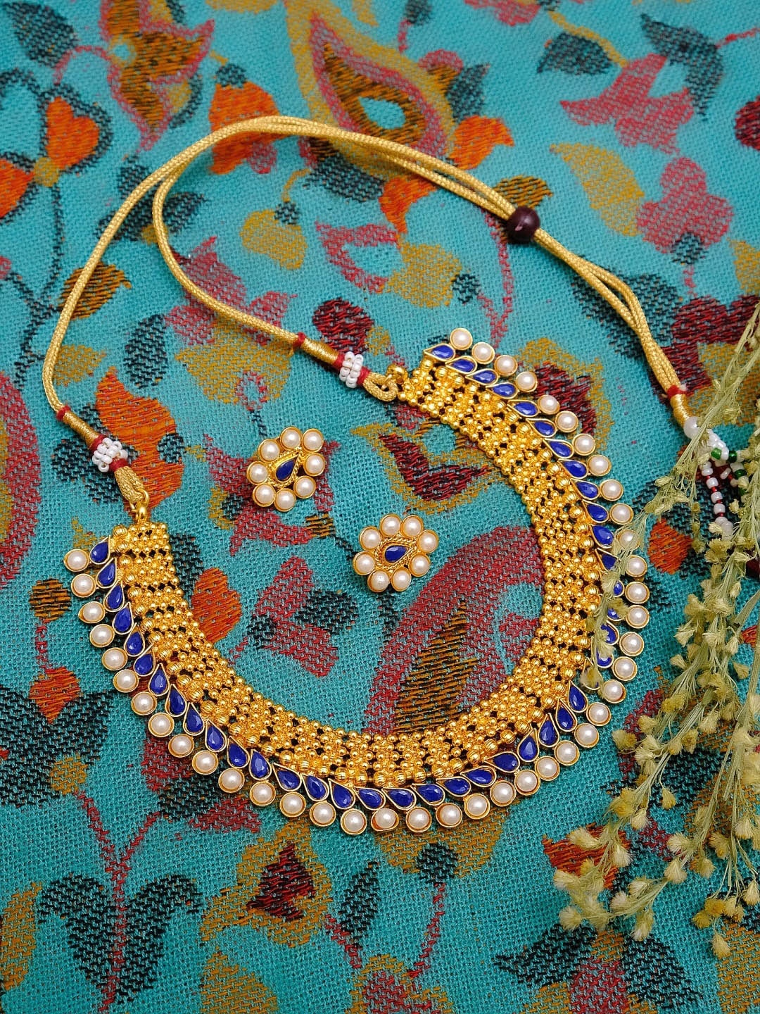 

Crunchy Fashion Blue & Off-White Gold-Plated Stone-Studded & Beaded Jewellery Set