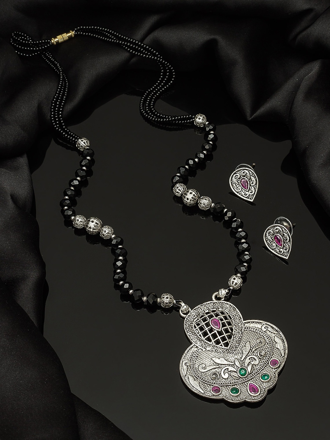 

aadita Oxidized Silver-Toned & Black Stone-Studded Tribal Mangalsutra With Earrings