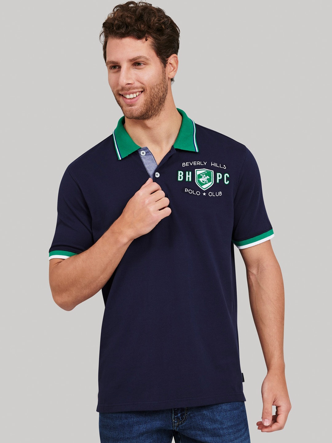 

Beverly Hills Polo Club Men Navy Blue Solid Polo Collar T-shirt