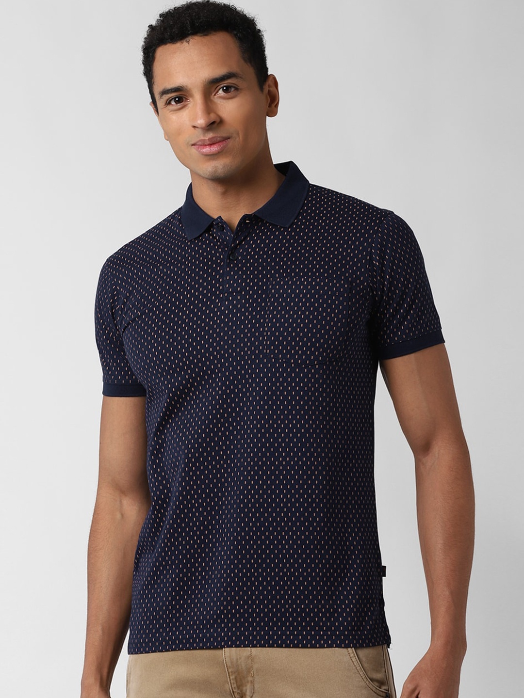 

Peter England Casuals Men Navy Blue Printed Polo Collar T-shirt