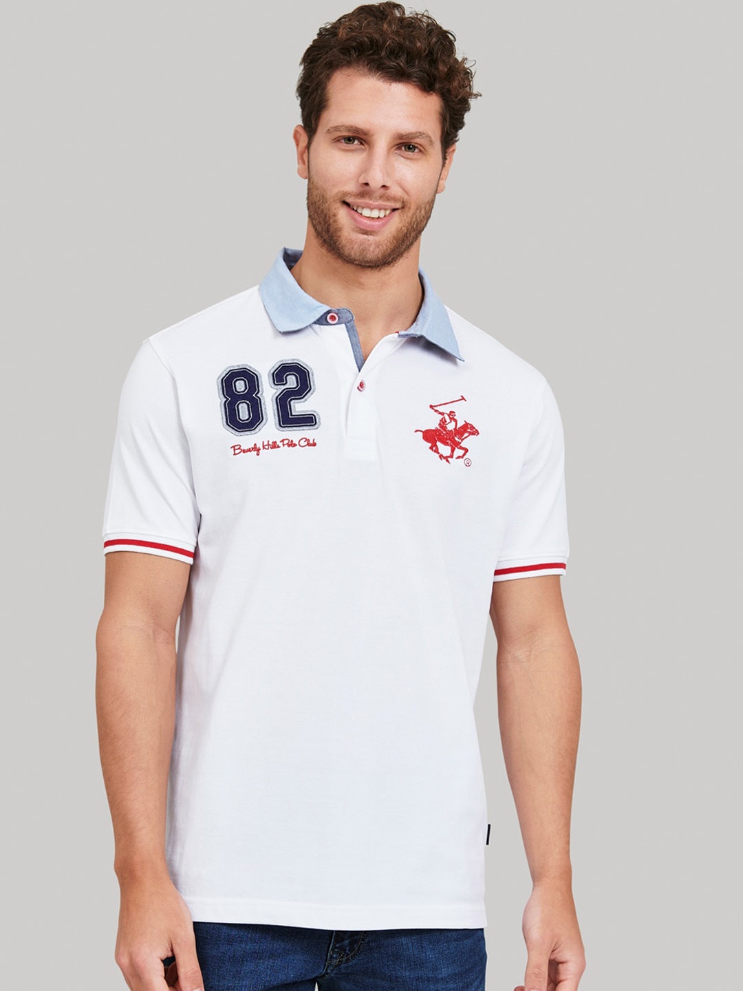 

Beverly Hills Polo Club Men White Solid Polo Collar T-shirt