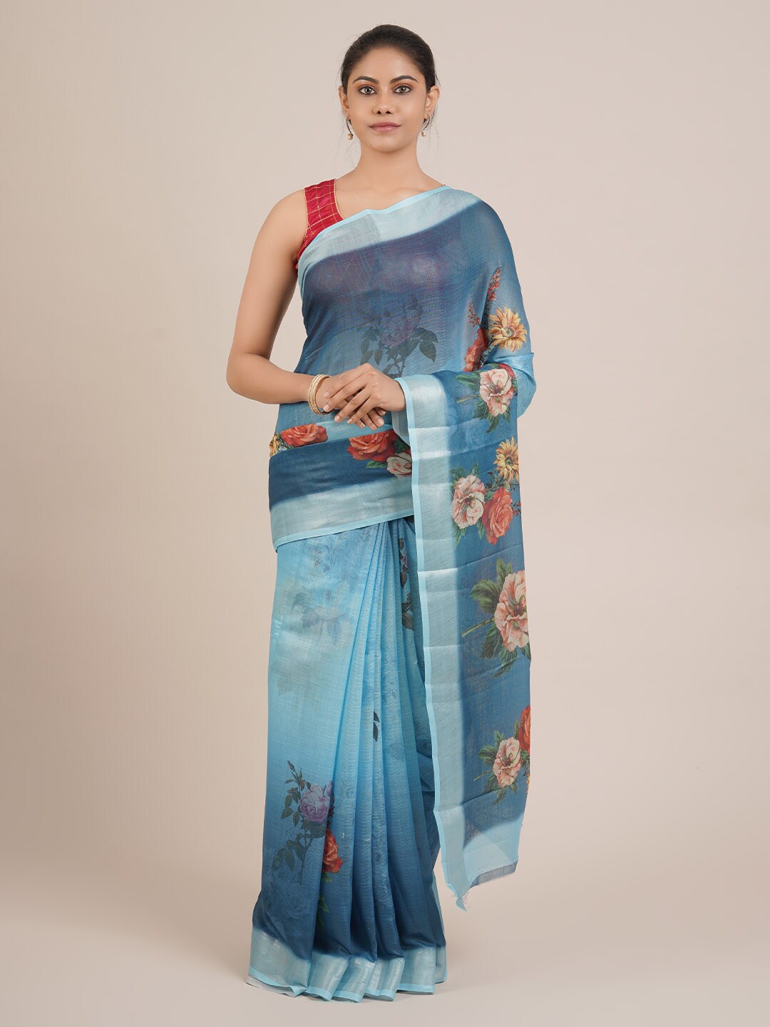 

Pothys Blue & Orange Linen Blend Printed Saree