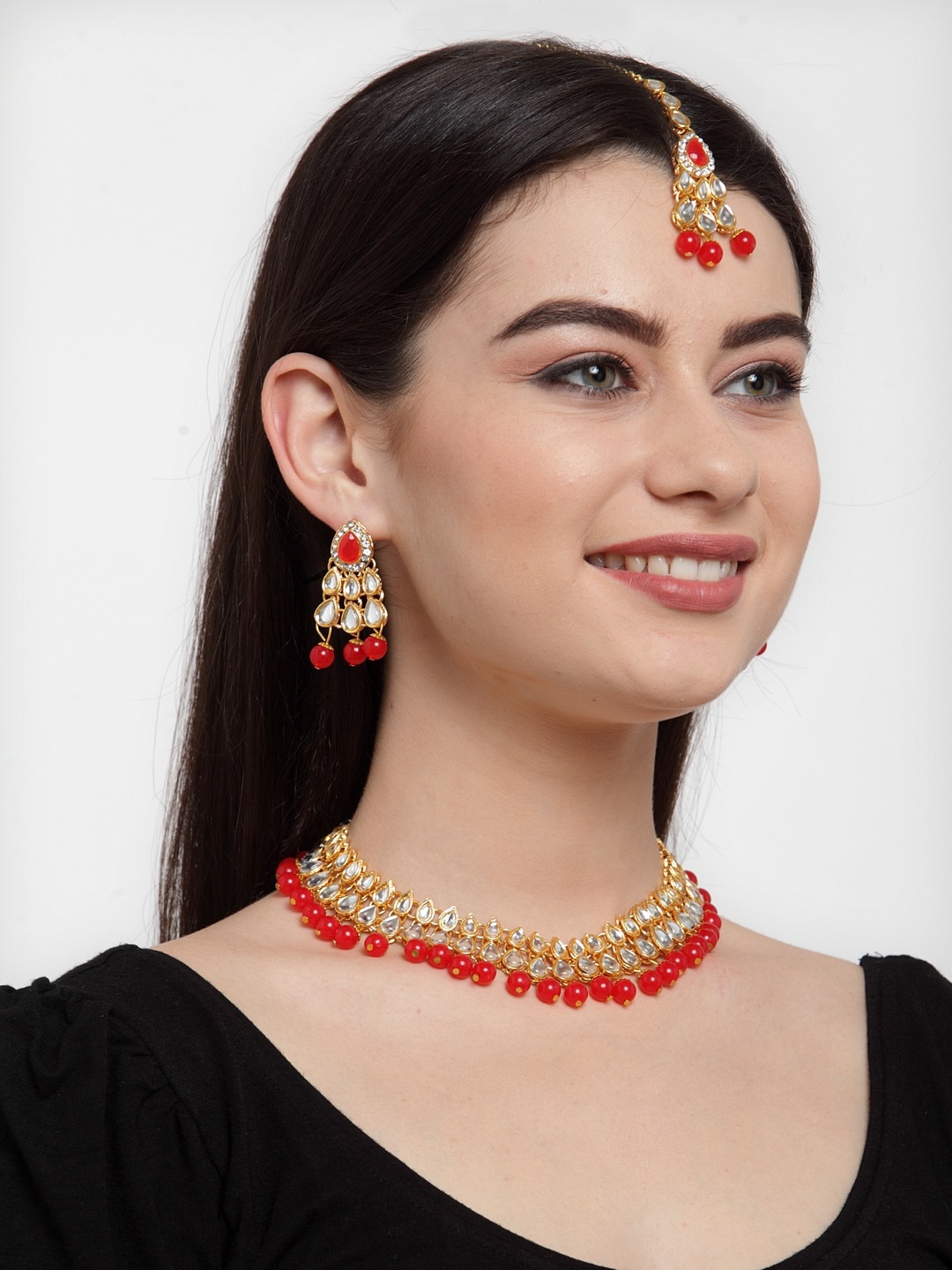 

ANIKAS CREATION Orange Gold-Plated Kundan-Studded & Beaded Jewellery Set