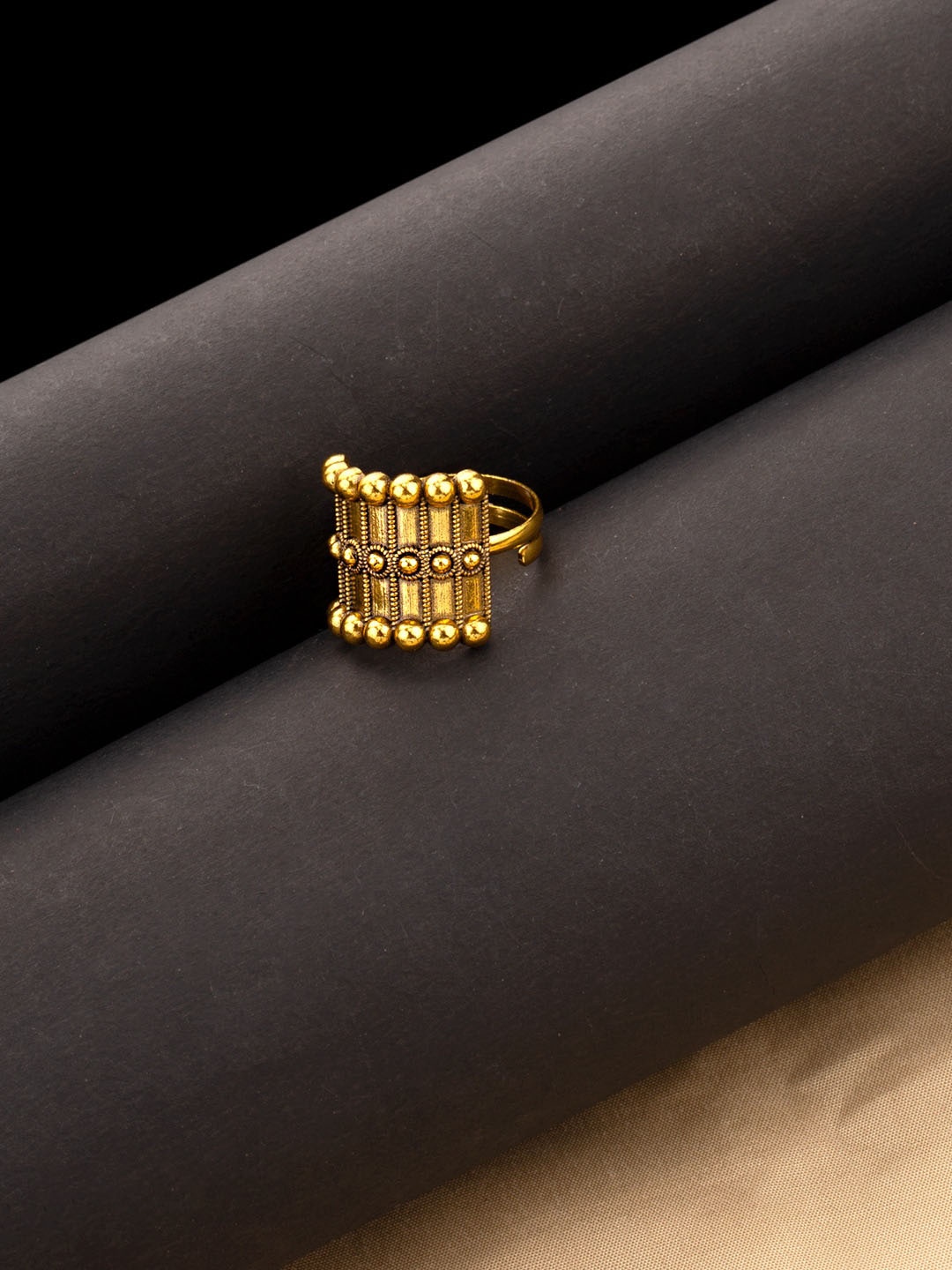 

Voylla Antique Gold-Plated Rava Ball Adjustable Statement Finger Ring