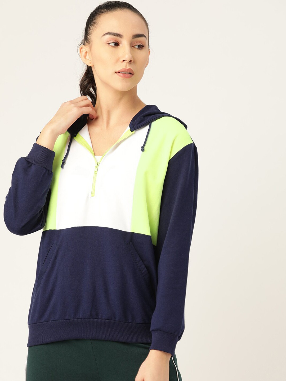 

Laabha Women Navy Blue & Fluorescent Green Colourblocked Hooded Sweatshirt