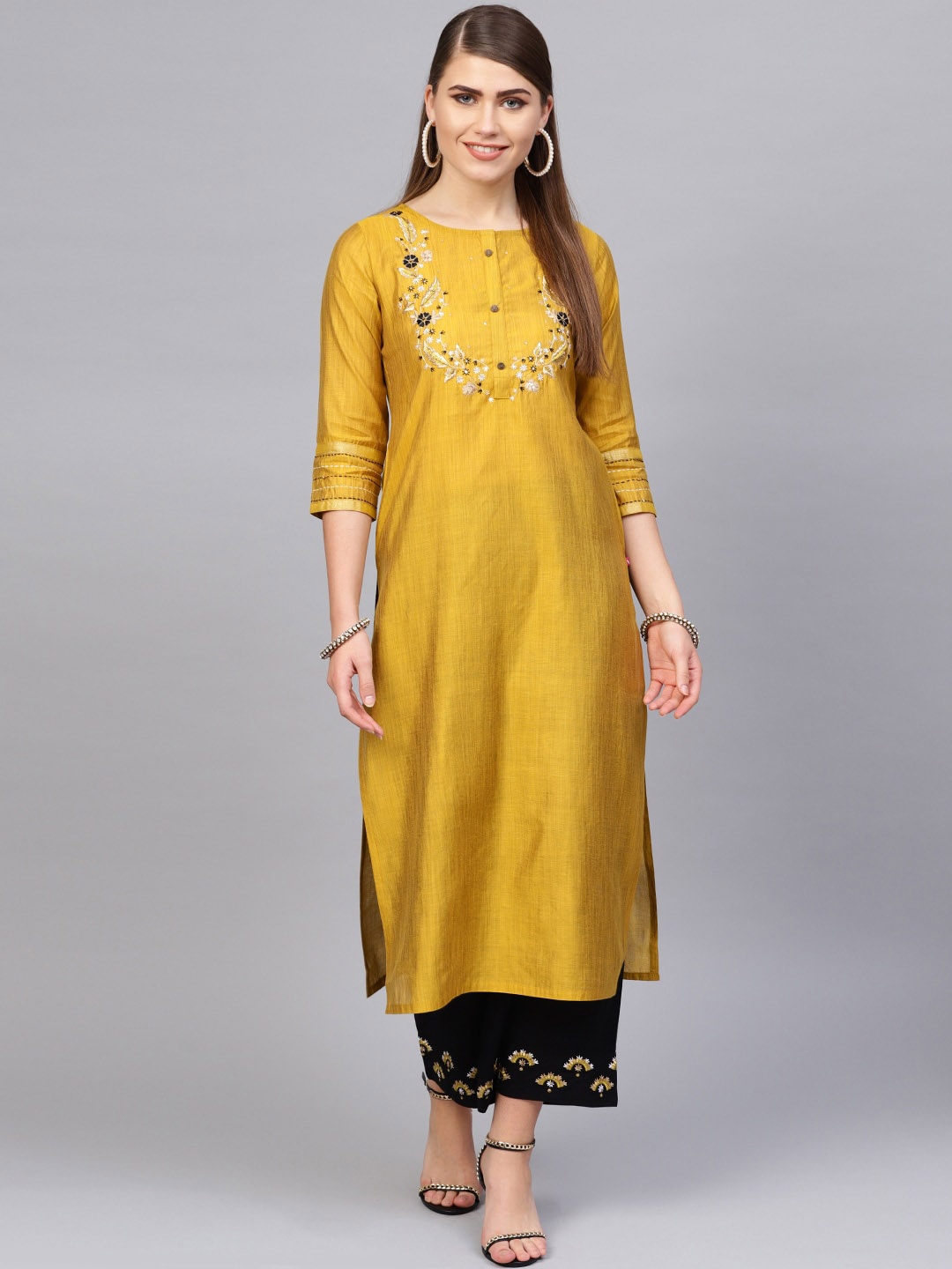 

Varanga Women Mustard & Black Floral Yoke Design Empire Straight Kurta with Palazzos