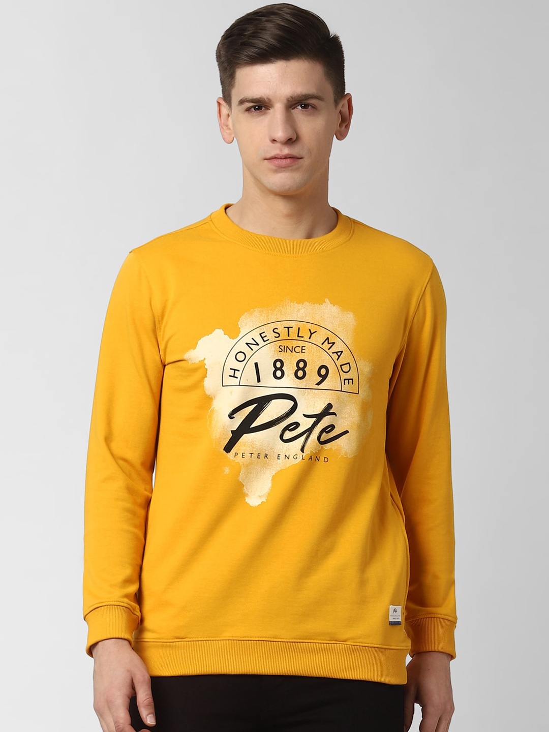 

Peter England Casuals Men Yellow Printed Sweatshirt