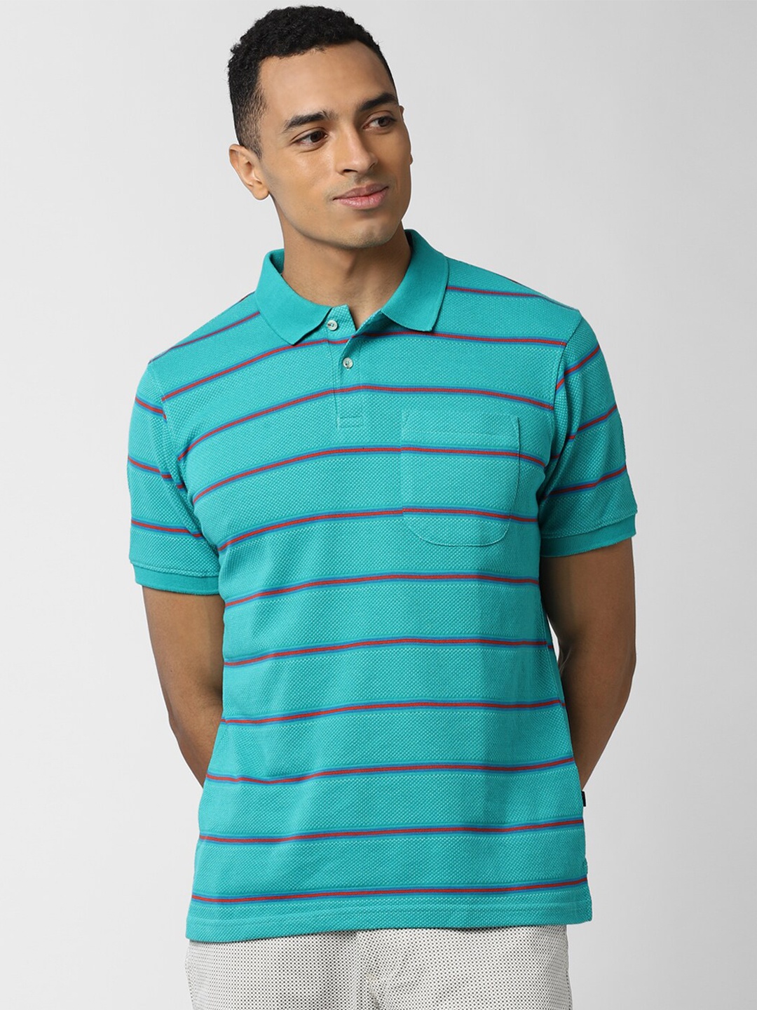 

Peter England Casuals Men Blue Striped Polo Collar T-shirt